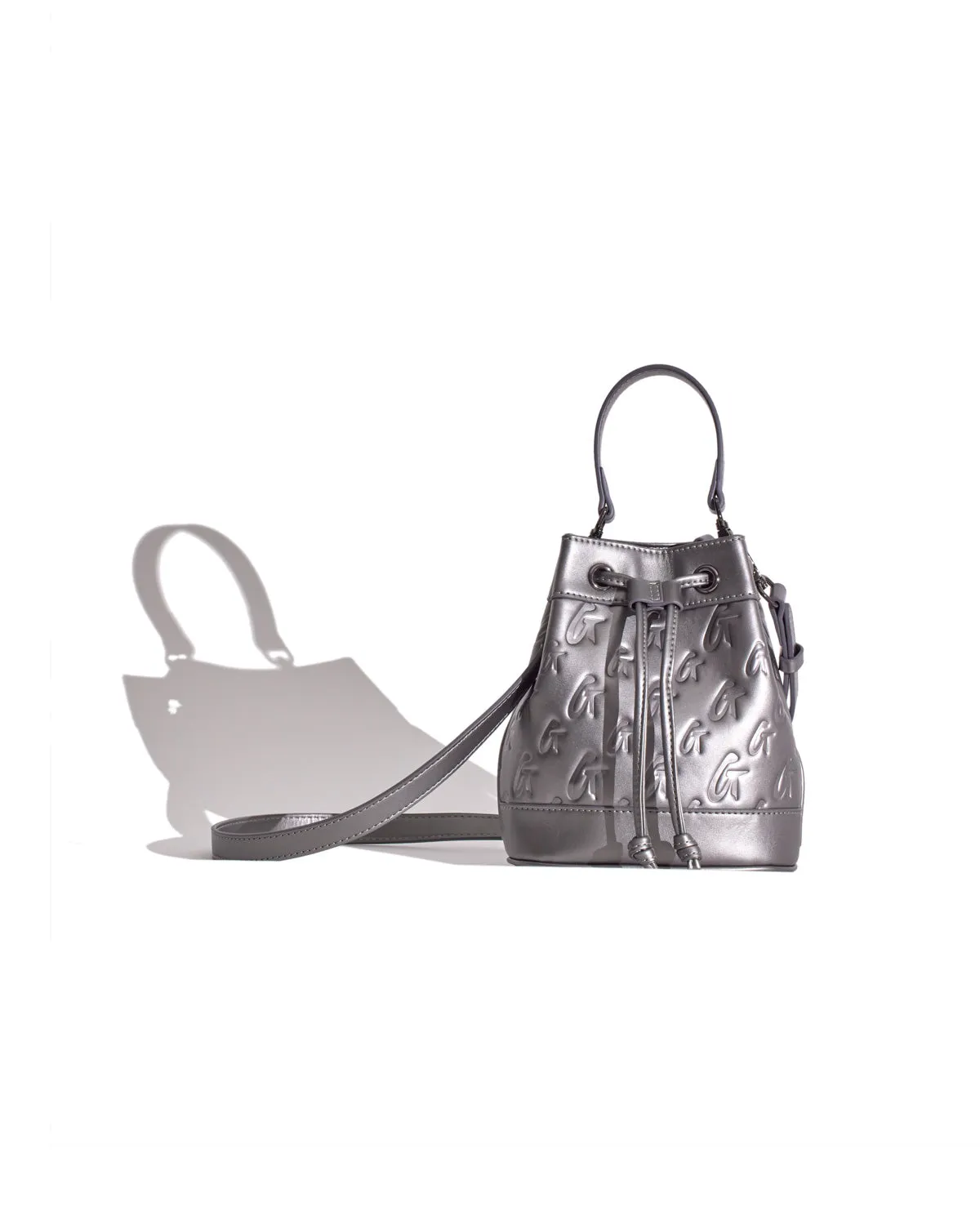 MINI MONOGRAM BUCKET BAG - PLATINUM