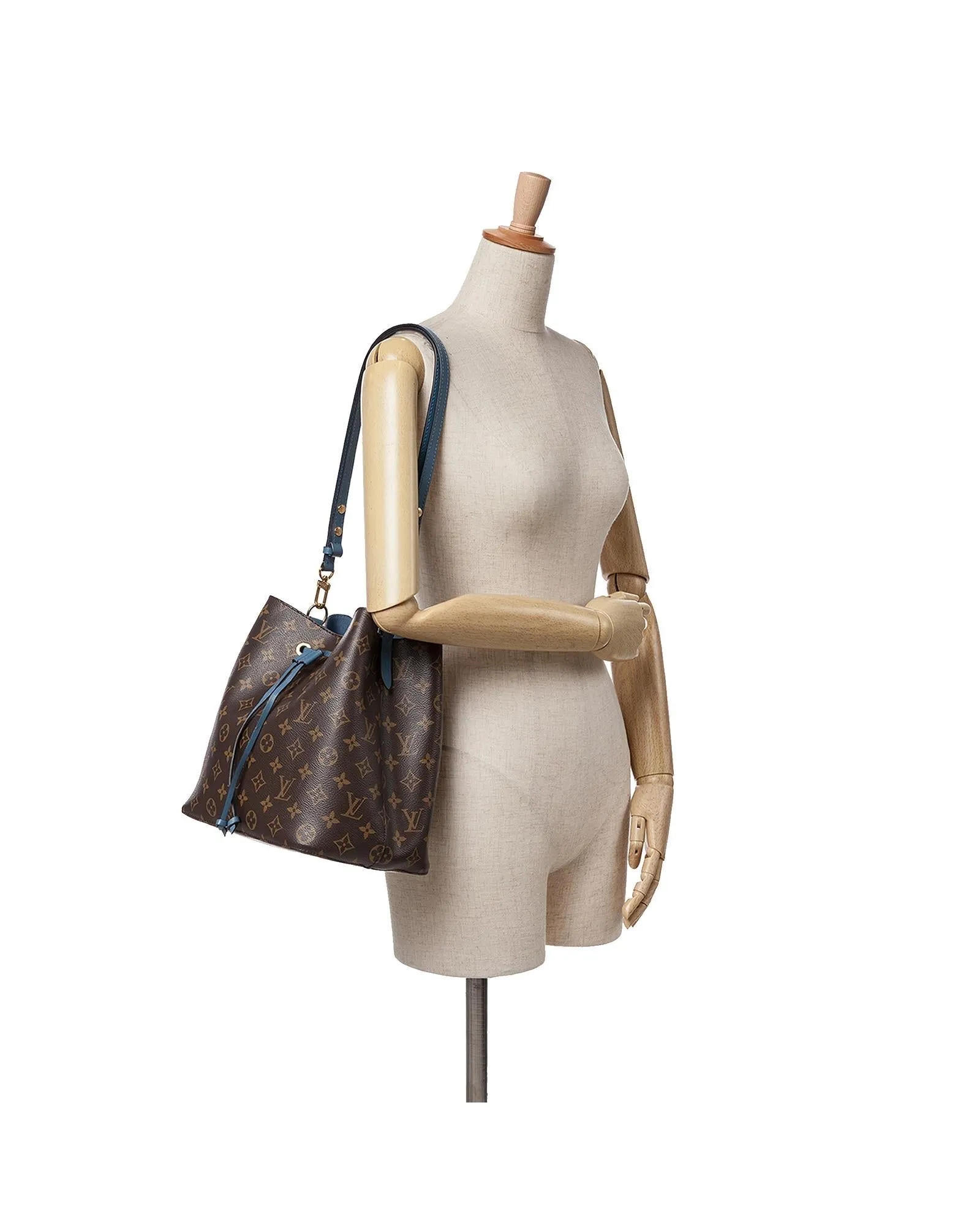 Monogram Canvas Drawstring Bag with Detachable Strap and Interior Zip Pocket