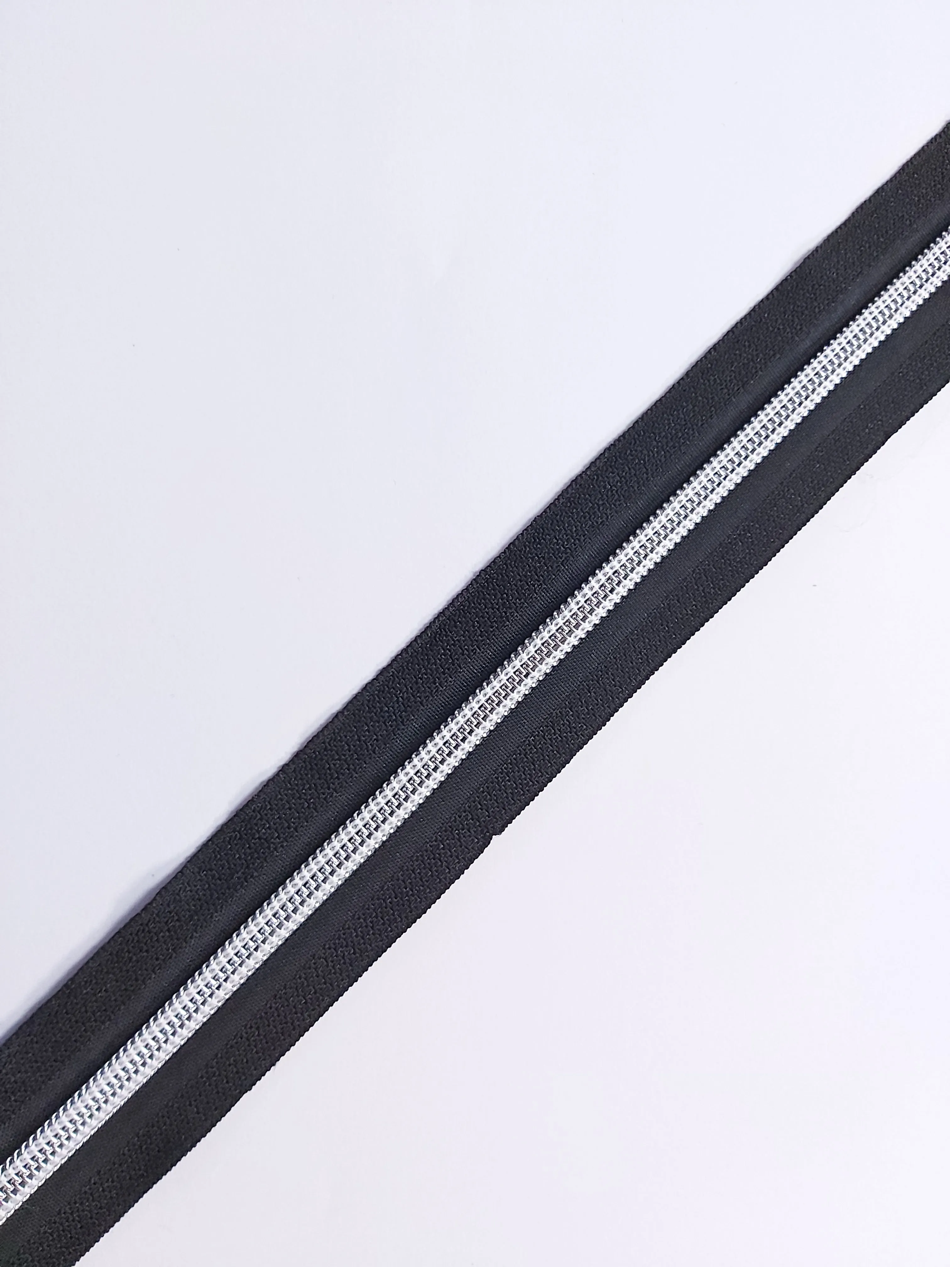 No5 Silver Teeth Nylon Zips Sold in Packs of 1 1/2 metre Lengths