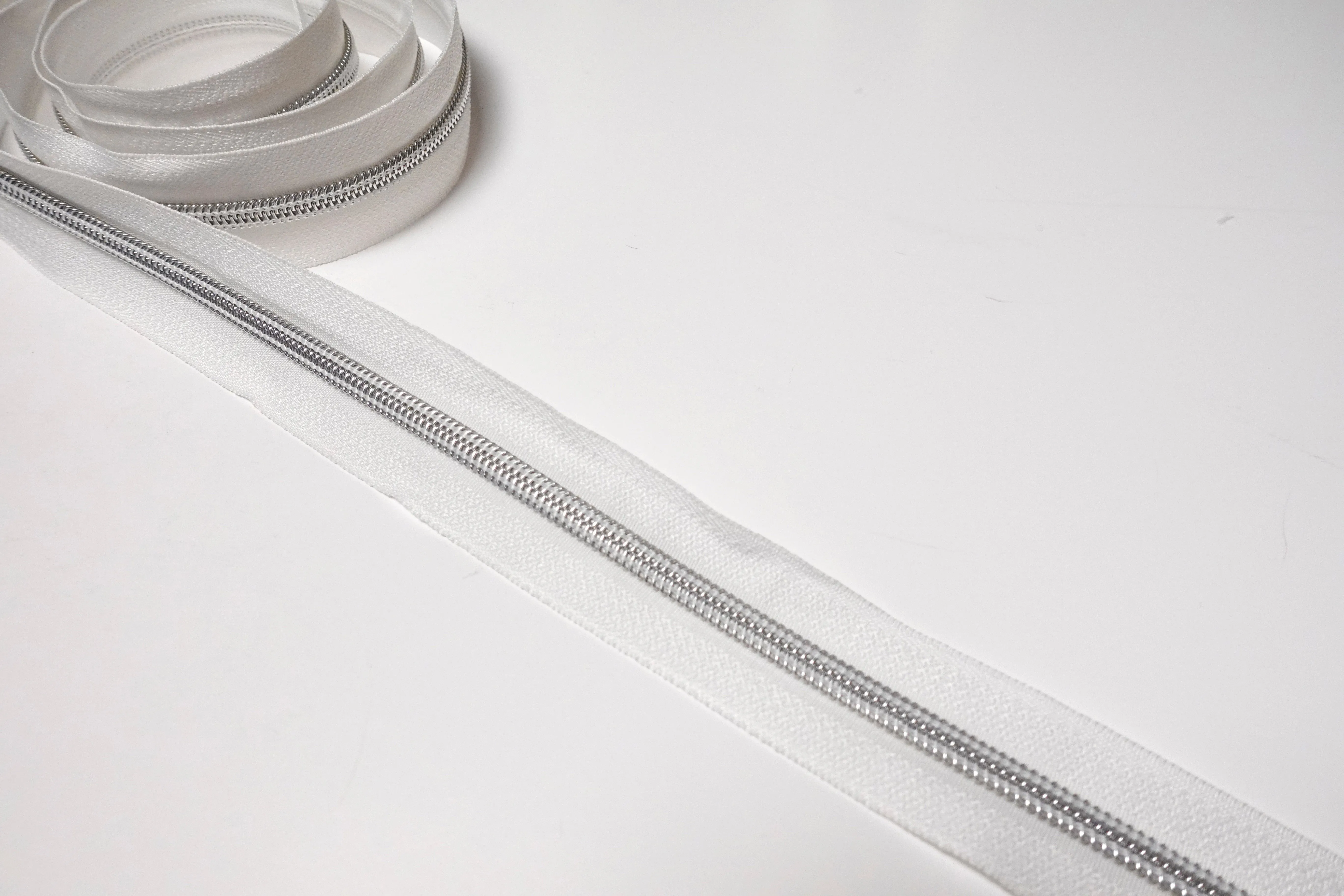 No5 Silver Teeth Nylon Zips Sold in Packs of 1 1/2 metre Lengths