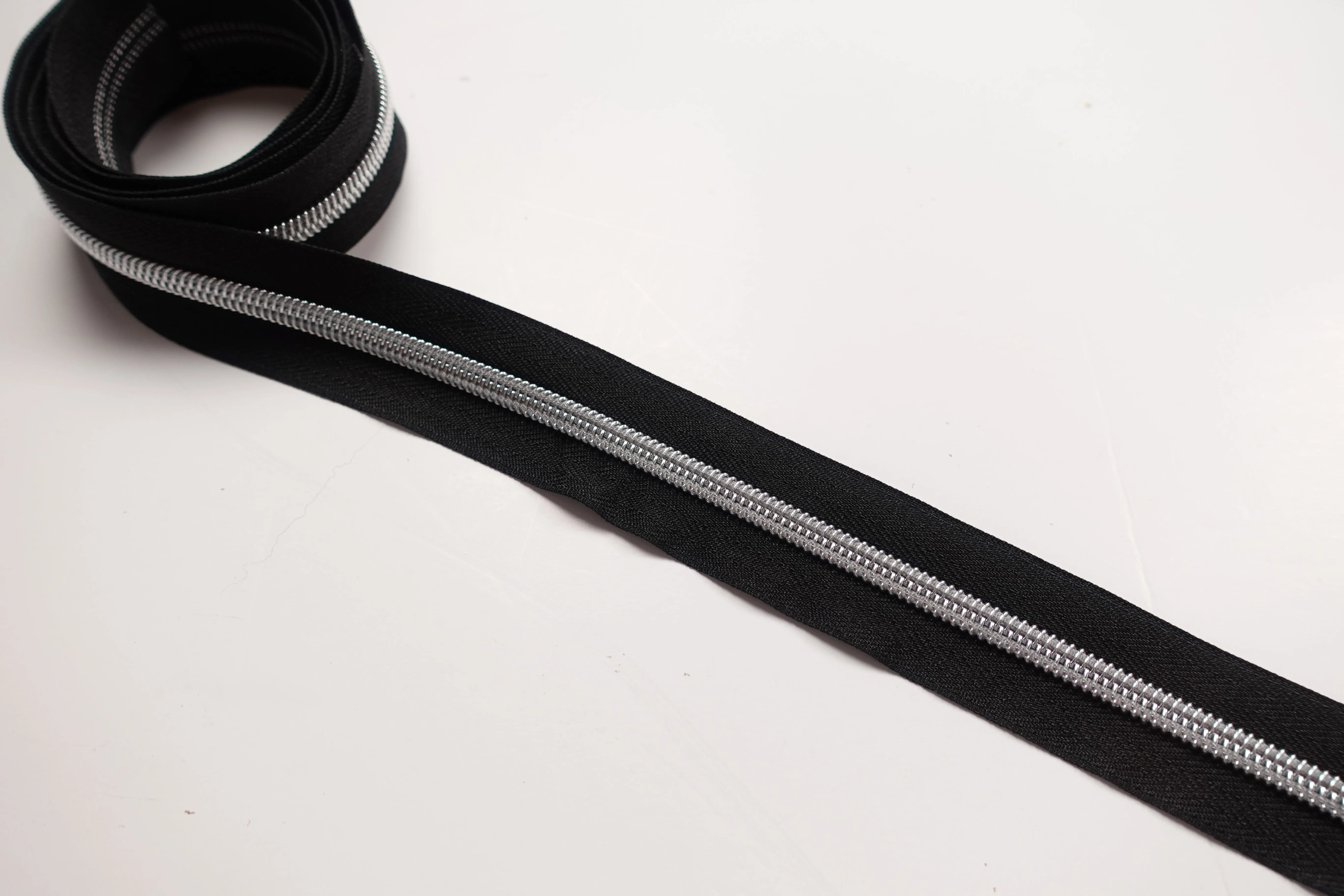 No5 Silver Teeth Nylon Zips Sold in Packs of 1 1/2 metre Lengths
