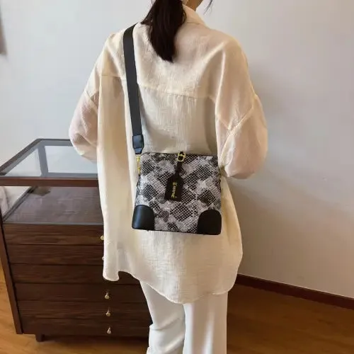 Sleek Leather Snakeskin Print Crossbody Bucket Bag