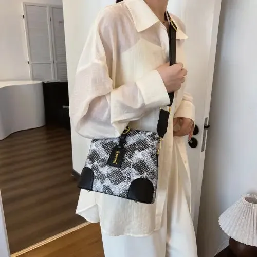 Sleek Leather Snakeskin Print Crossbody Bucket Bag