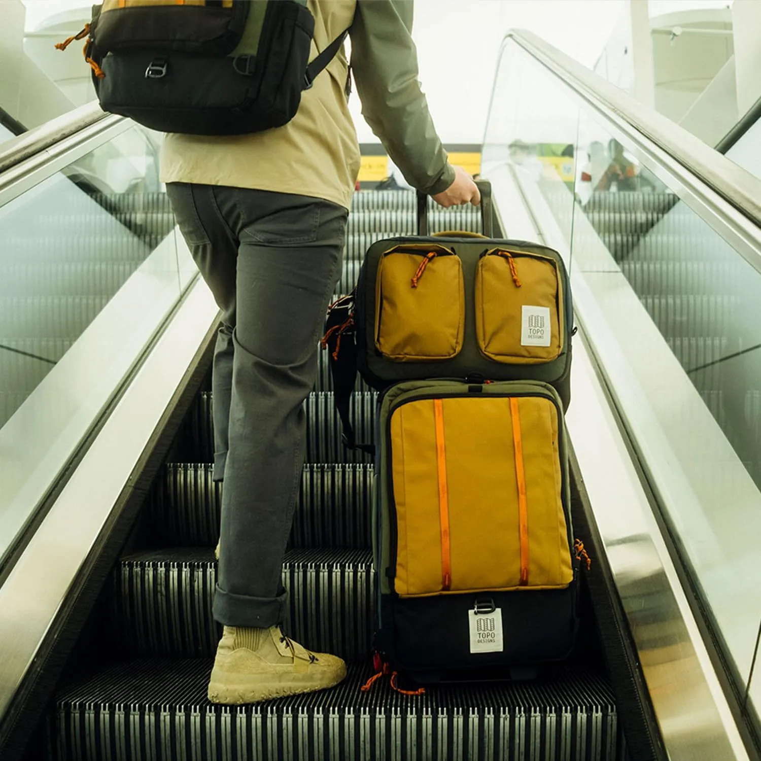 Topo Designs Global Travel Roller Bag Suitcase, Carry-On Friendly, 3 Carry Options, Smooth Heavy Duty Wheels, Telescoping Handle, Designed in Denver CO USA, PFAS Free (Black)