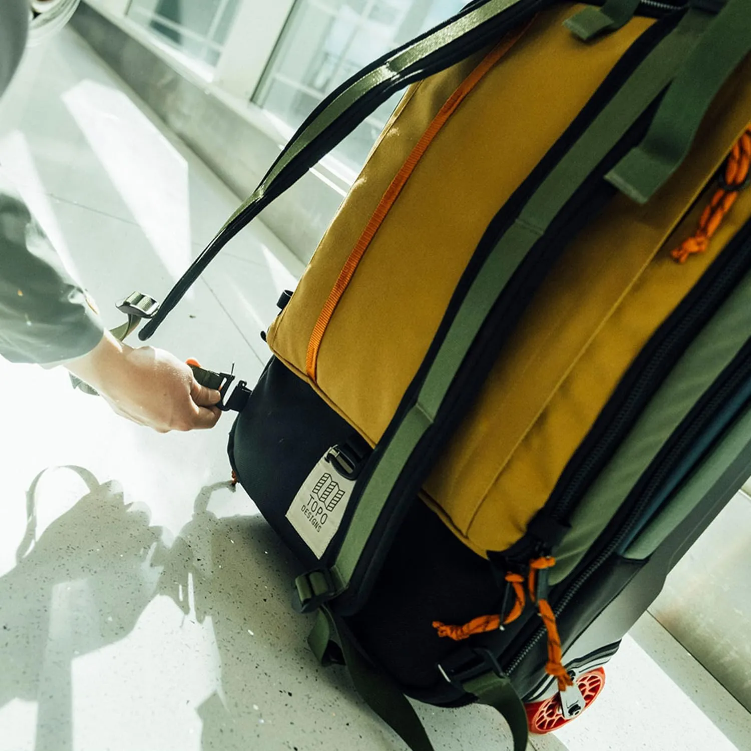 Topo Designs Global Travel Roller Bag Suitcase, Carry-On Friendly, 3 Carry Options, Smooth Heavy Duty Wheels, Telescoping Handle, Designed in Denver CO USA, PFAS Free (Sea Pine)